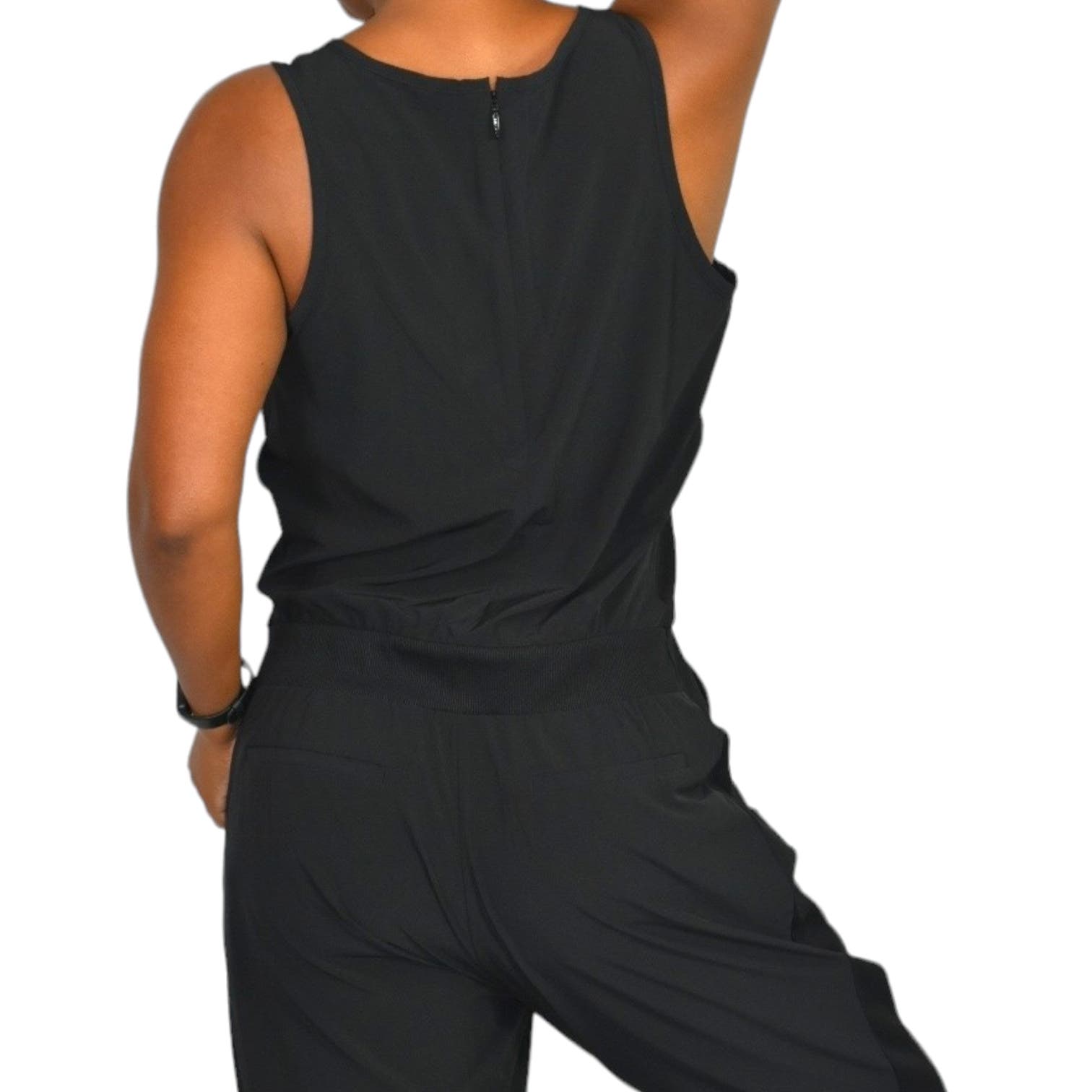 Athleta Brooklyn Jumpsuit Black Silky Pantsuit Tapered Casual Sleeveless Pockets Size 10